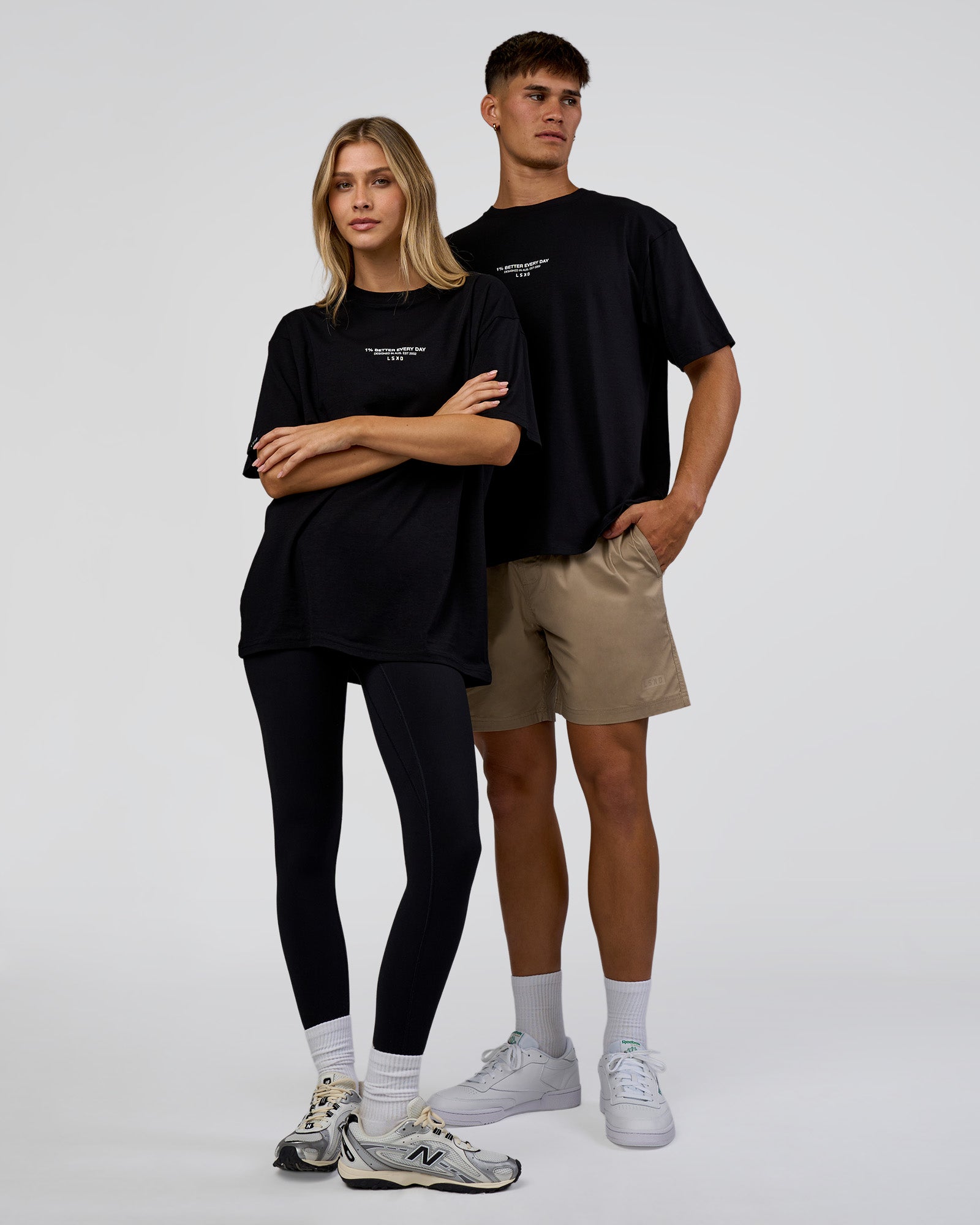 Duo wearing 1% Better Every Day EST FLXCotton Oversized Tee - Black | Model:Both | Size:Duo