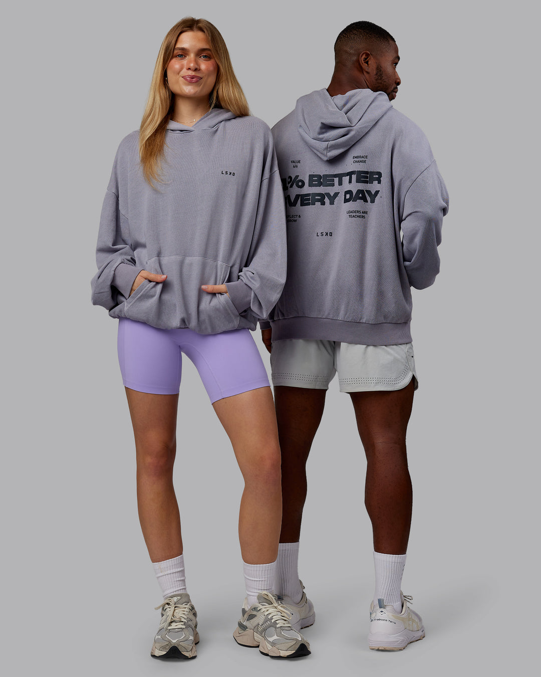 Duo wearing 1% Better Value Series Oversized Hoodie - Violet Ray-Black| Model:Both | Size:Duo