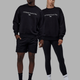 Duo wearing Unisex 1% Better Sweater Oversize - Black-White
