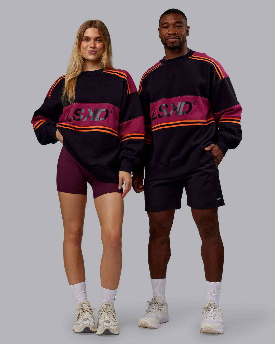 Duo wearing A-Team Sweater Oversize - Black-Plum Berry | Model:Both | Size:Duo