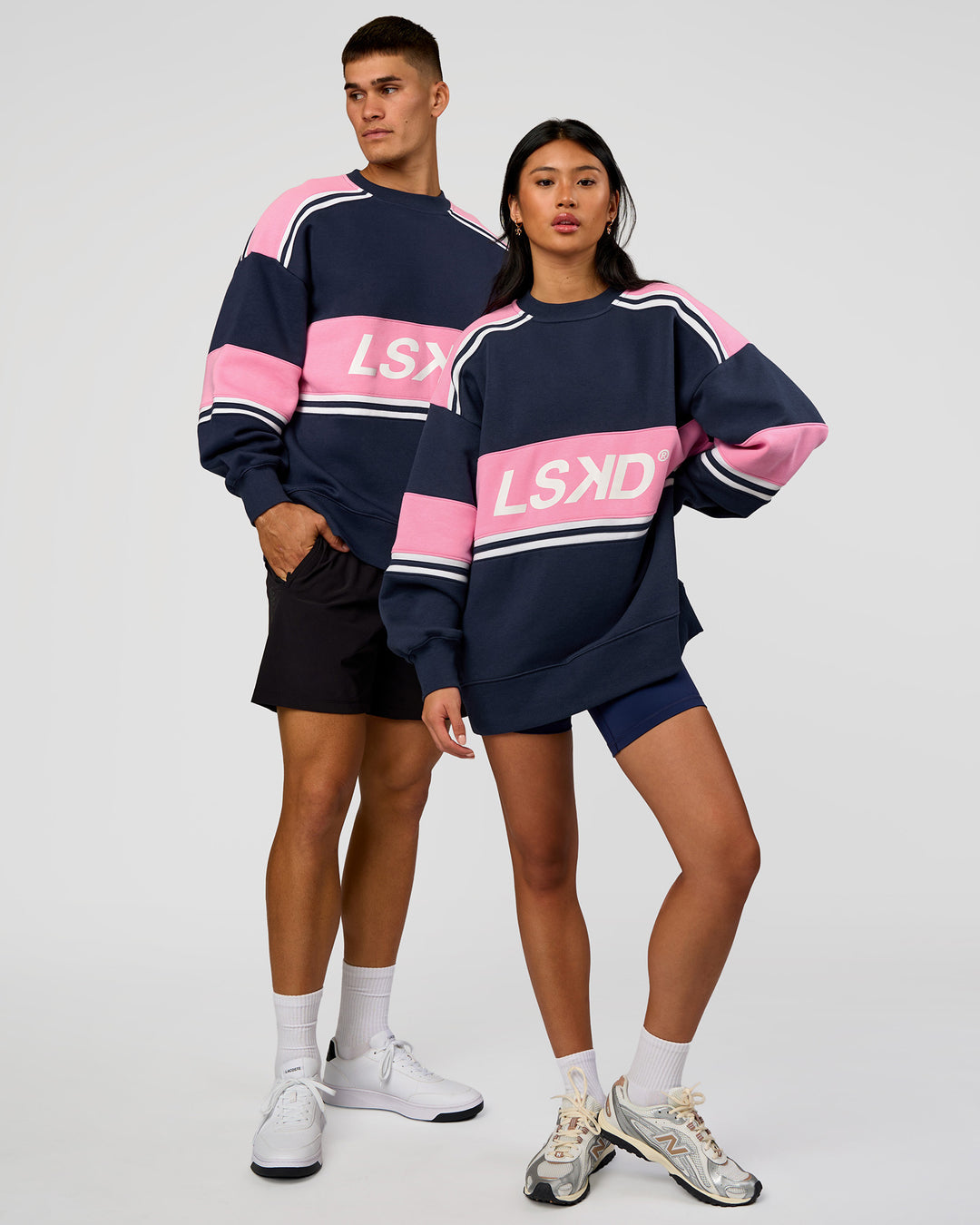 Duo wearing A-Team Sweater Oversize - Future Navy-Candy Pink | Model:Both | Size:Duo
