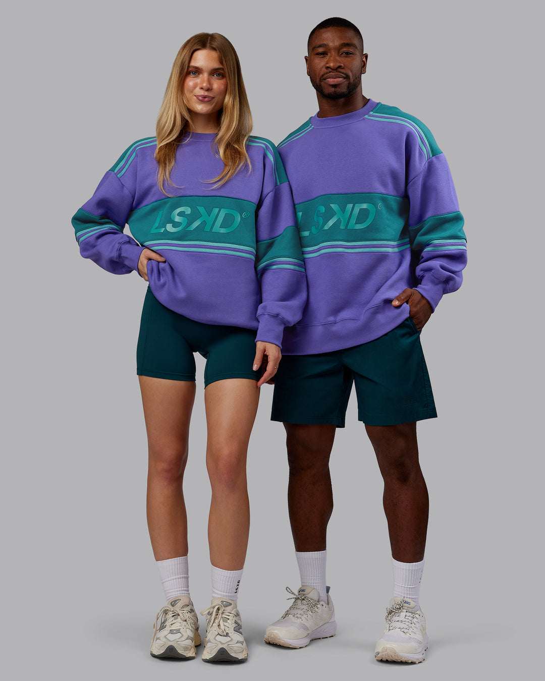 Duo wearing A-Team Sweater Oversize - Royal Purple-Multi | Model:Both | Size:Duo