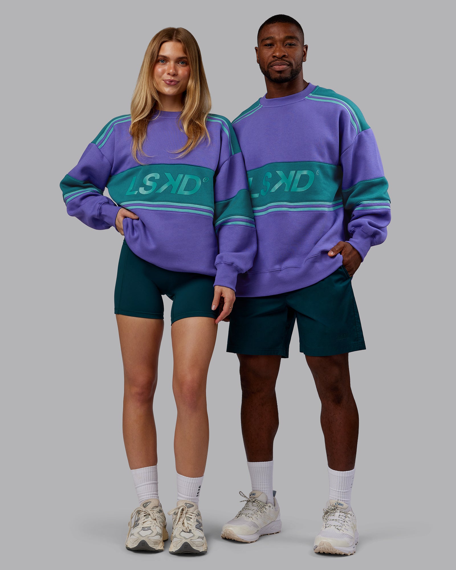 Duo wearing A-Team Sweater Oversize - Royal Purple-Multi | Model:Both | Size:Duo