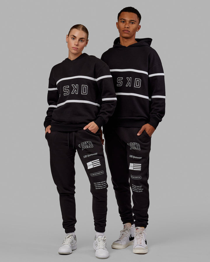 Duo wearing Unisex Academy Track Pant - Black