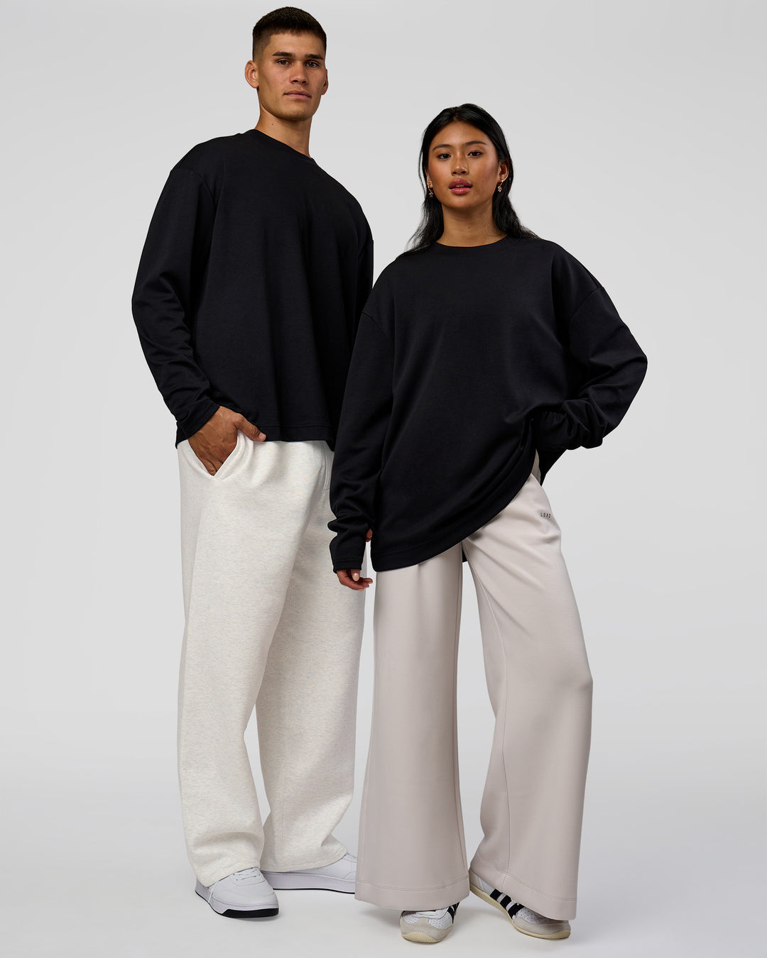 Duo wearing AfterDark ZeroCrease Long Sleeve Tee - Black | Model:Both | Size:Duo