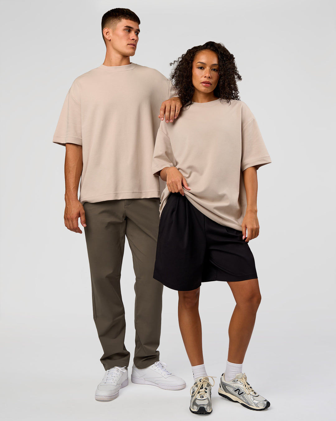 Duo wearing AfterDark ZeroCrease Oversized Tee - Shale Beige | Model:Both | Size:Duo