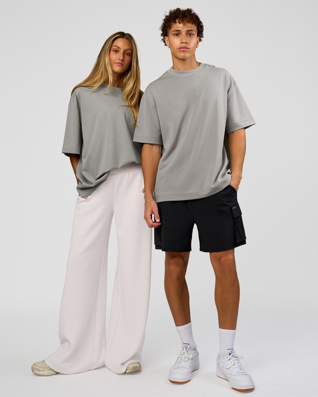 Duo wearing AfterDark ZeroCrease Oversized Tee - Alloy | Model:Both | Size:Duo