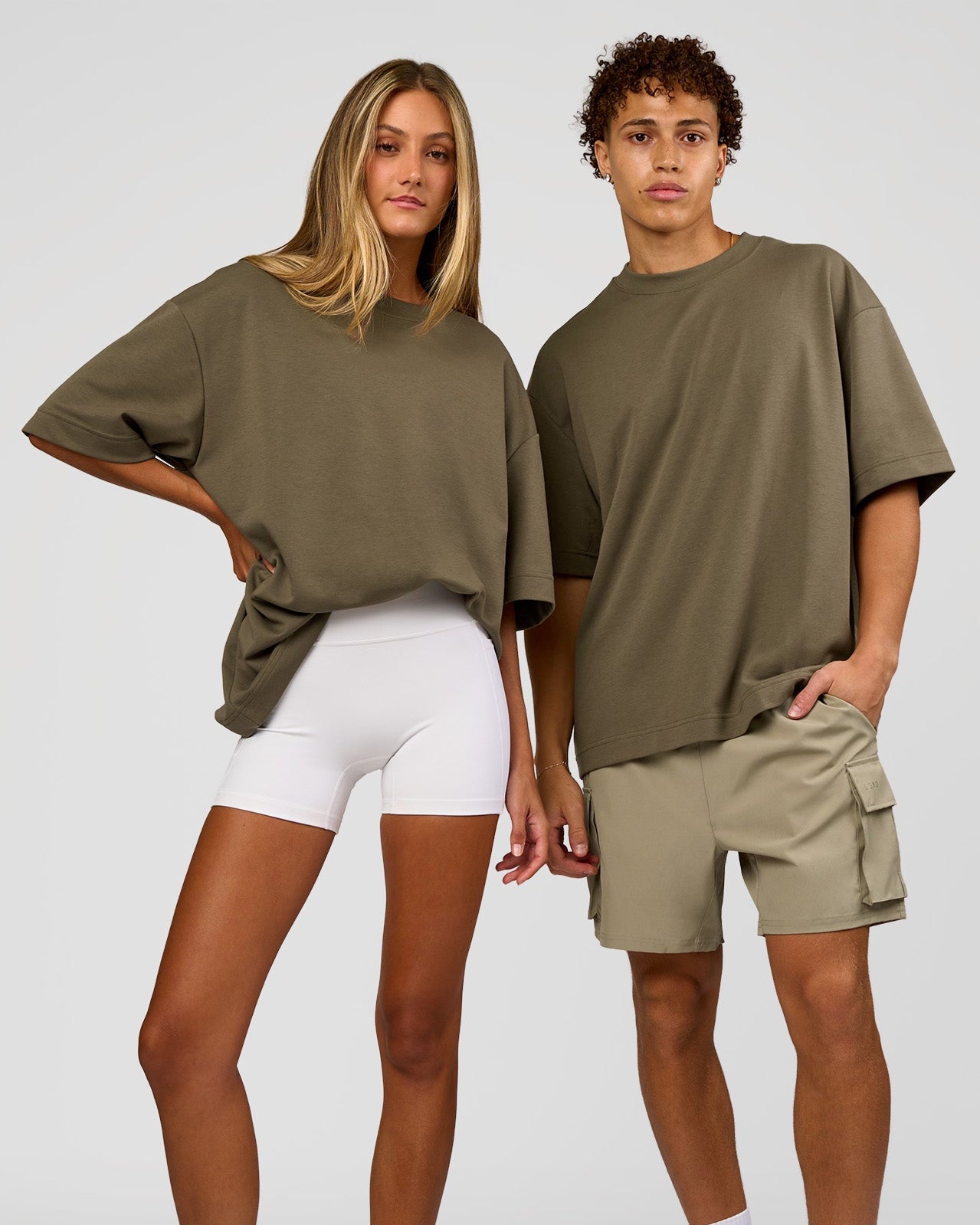 Duo wearing AfterDark ZeroCrease Oversized Tee - Walnut Grey | Model:Both | Size:Duo