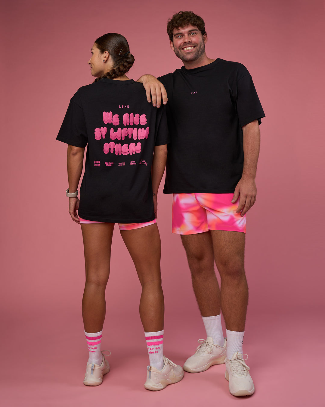 Woman wearing BCAM FLXCotton Oversized Tee - Black-Ultra Pink | Model:Duo | Size:Both