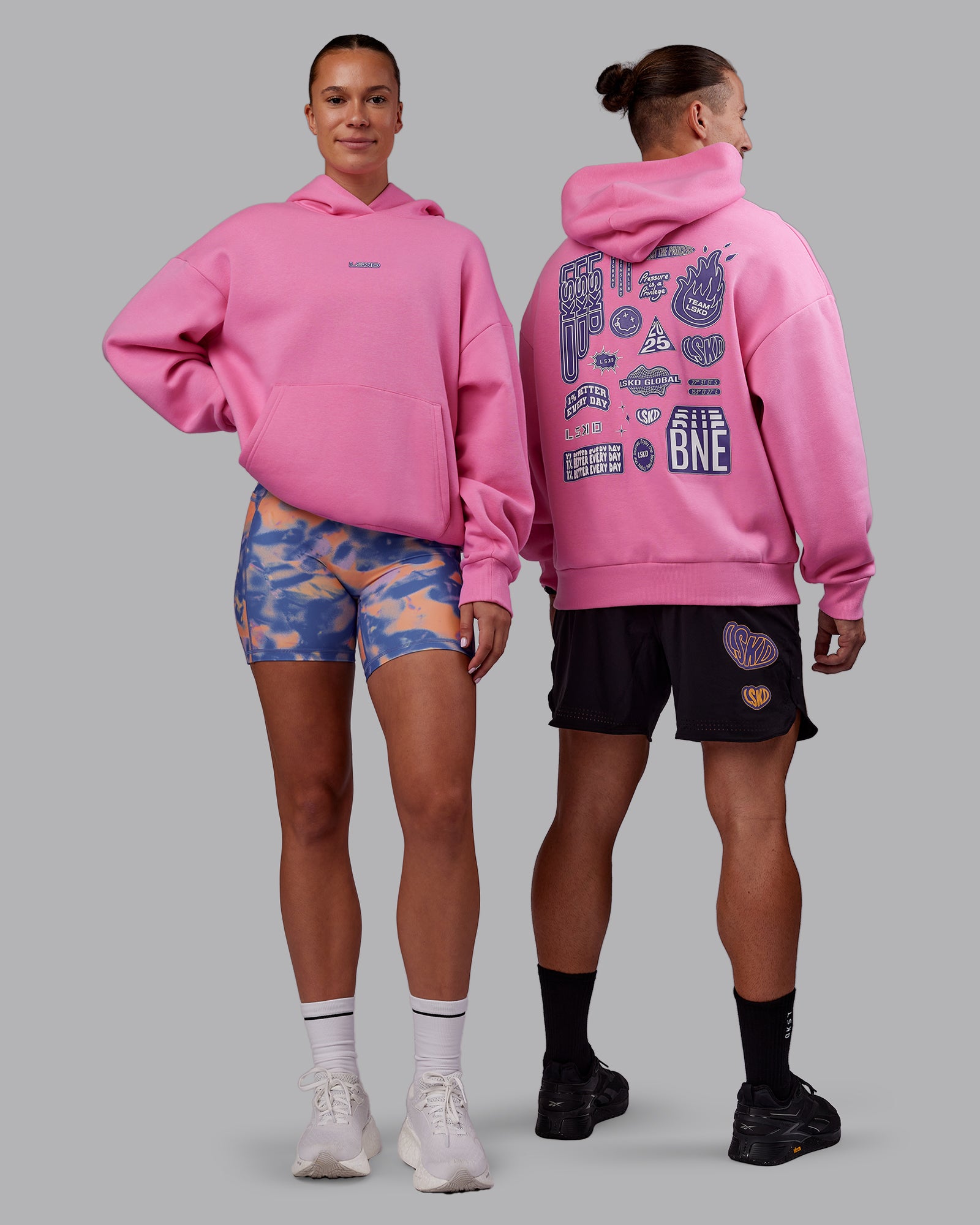 Duo wearing CFT BNE 25 Oversized Hoodie - Candy Pink-Purple Opulence | Model:Both | Size:Duo