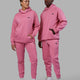 Duo wearing Unisex Capsule Hoodie Oversize - Pink Rose