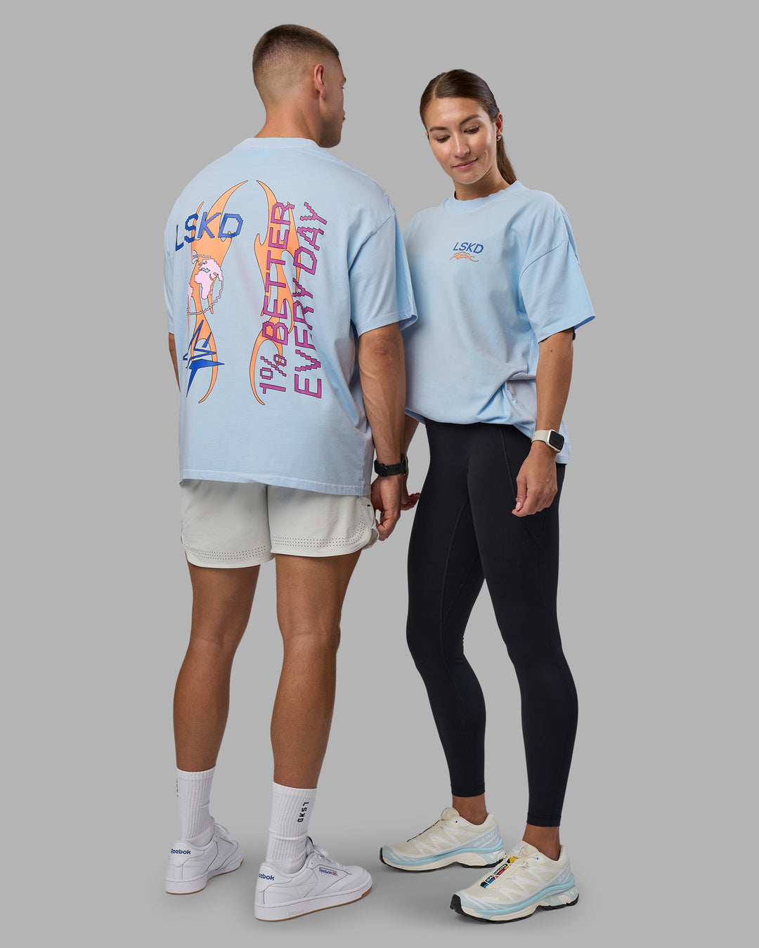 Duo wearing Digital World Heavyweight Oversized Tee - Open Air-Cantaloupe | Model:Both | Size:Duo