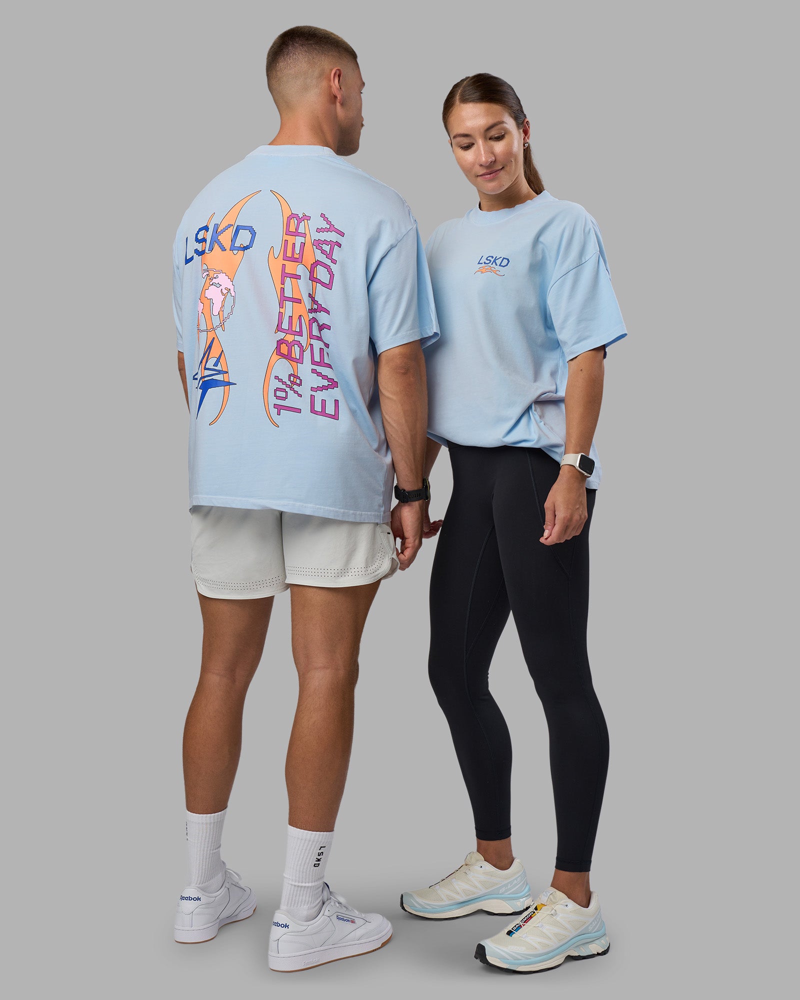 Duo wearing Digital World Heavyweight Oversized Tee - Open Air-Cantaloupe | Model:Both | Size:Duo