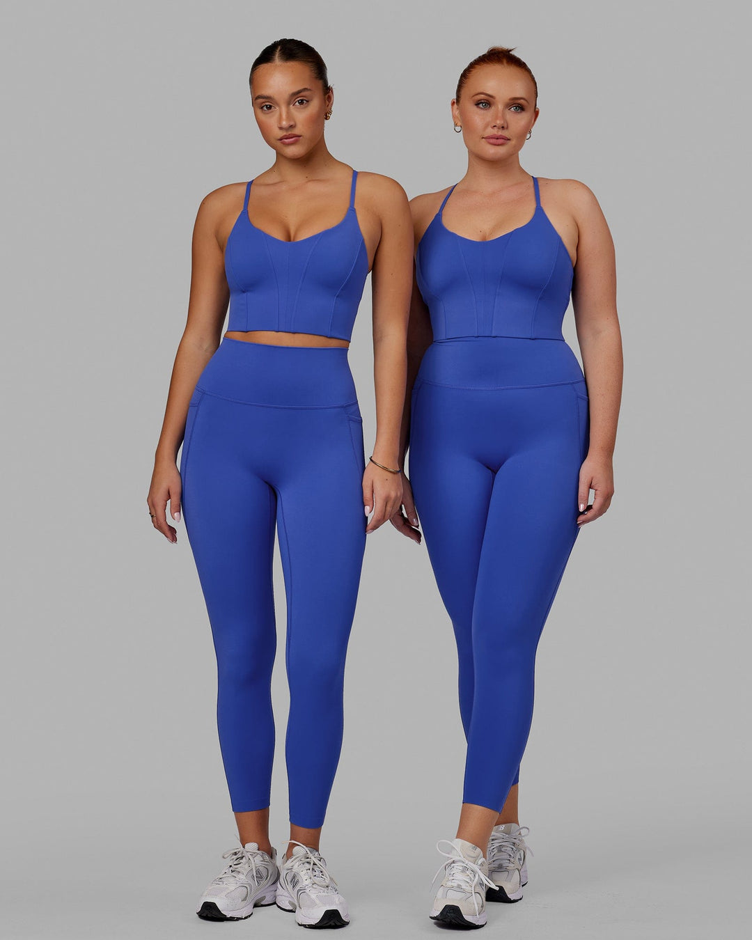 Woman wearing Elixir 7/8 Tights With Pockets - Power Cobalt
