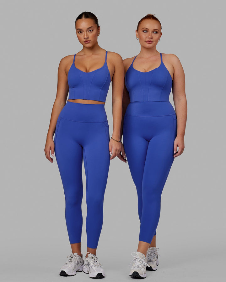 Woman wearing Elixir 7/8 Tights With Pockets - Power Cobalt