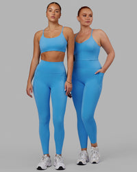 Woman wearing Elixir Ultra High-Rise Full Length Legging Pockets - Azure Blue
