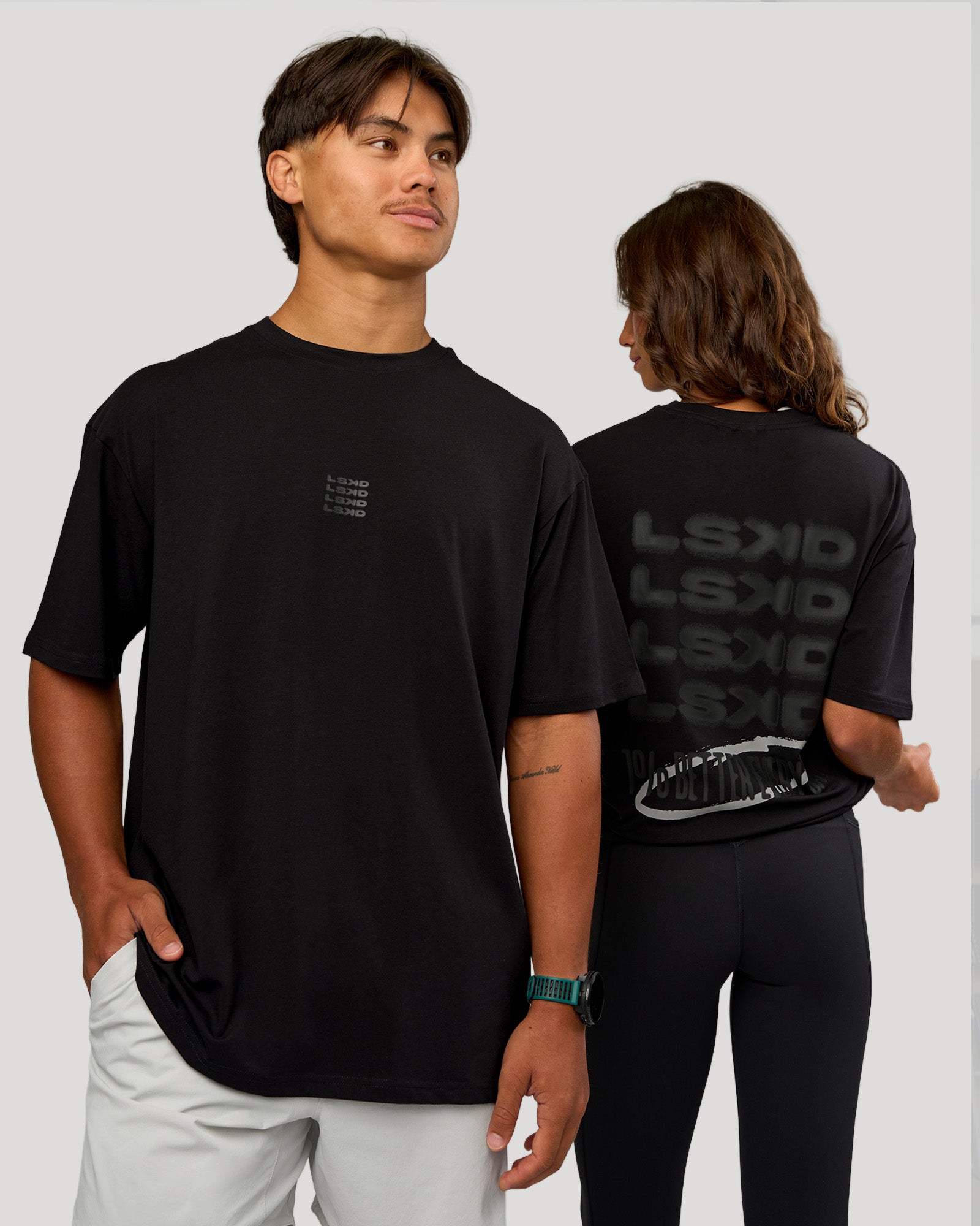 Duo wearing Everyday Elevation FLXCotton Oversized Tee - Black-Black | Model:Both | Size:Duo