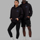 Duo wearing Unisex Guild Hoodie Oversize - Black
