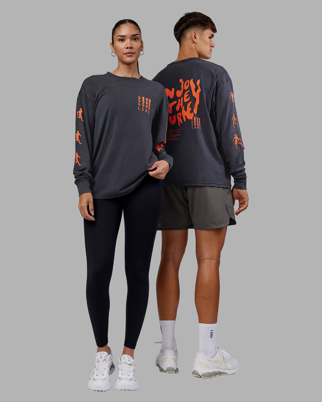 Duo wearing Inferno Journey FLXCotton Oversized Long Sleeve Tee - Washed Black-Ultra Orange | Model:Both | Size:Duo