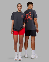 Duo wearing Inferno Journey FLXCotton Oversized Tee - Black Washed-Ultra Orange | Model:Both | Size:Duo