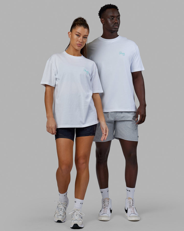 Duo wearing Unisex Journey Tee Oversize - White