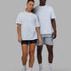 Duo wearing Unisex Journey Tee Oversize - White