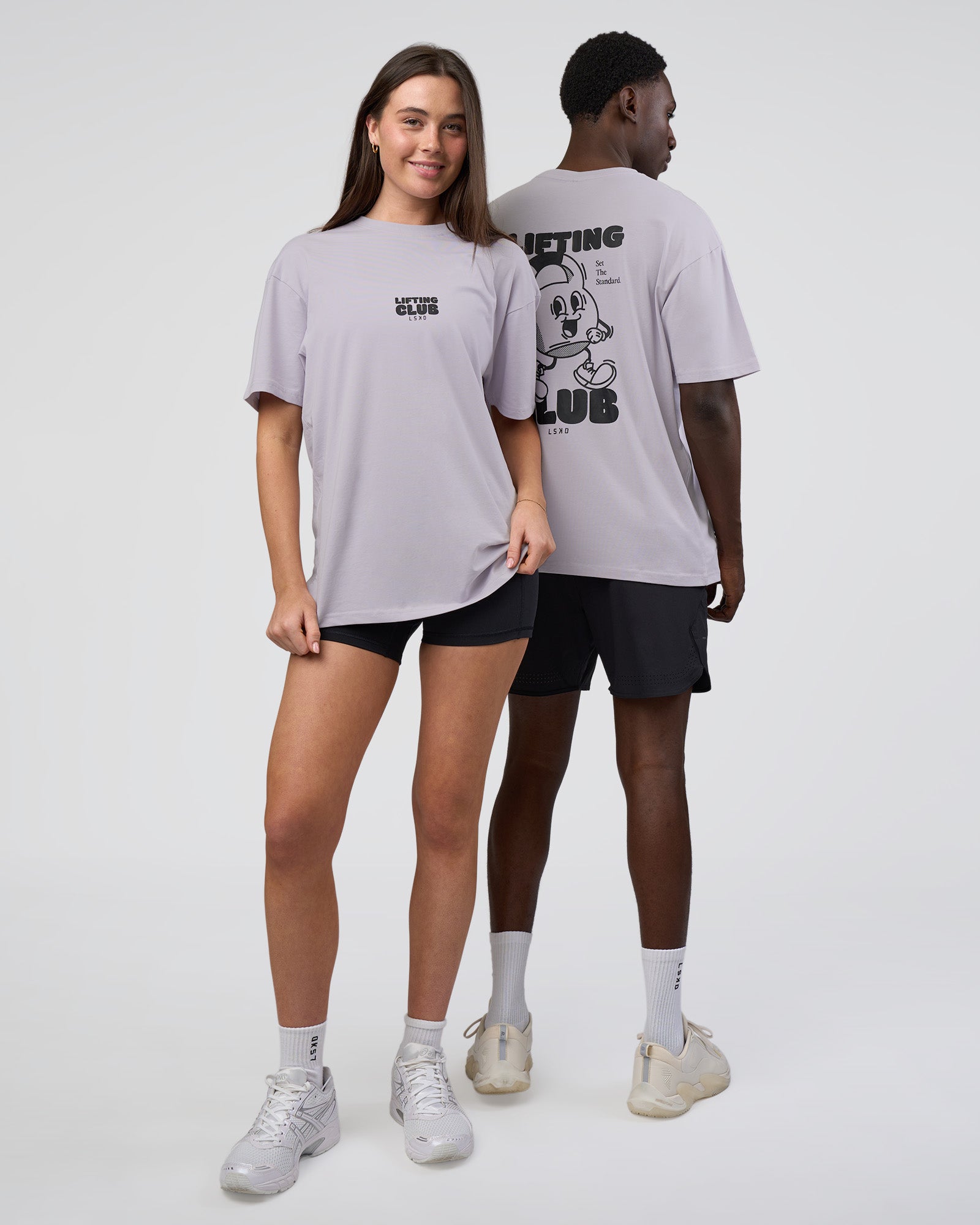 Duo wearing Kettle B FLXCotton Oversized Tee - Galactic Lilac-Black | Model:Both | Size:Duo