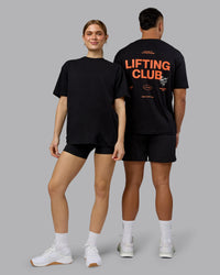 Duo wearing Lifting Club FLXCotton Tee Oversize - Black-Ultra Orange | Model:Both | Size:Duo