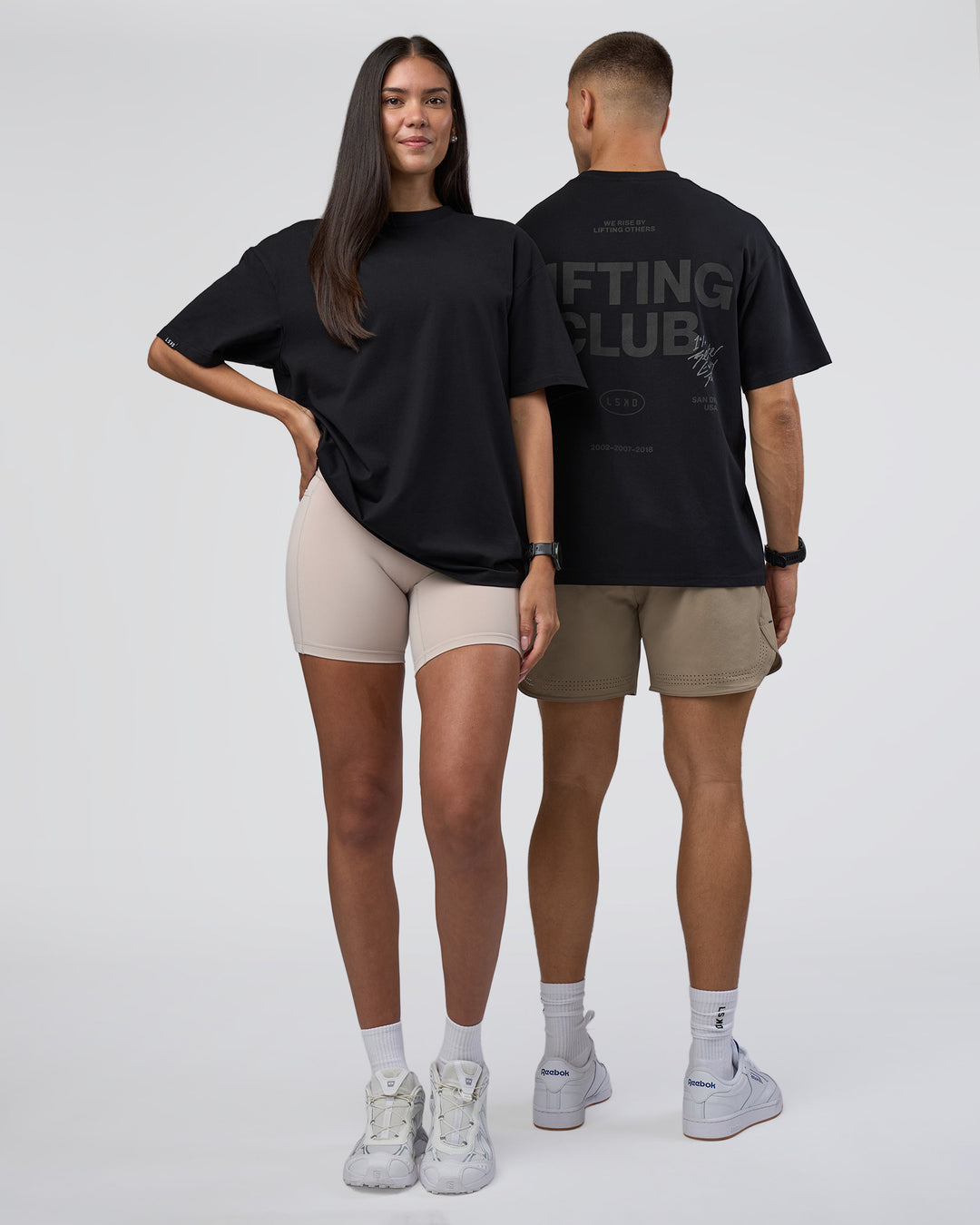 Duo wearing Lifting Club FLXCotton Tee Oversize - Black-Black | Model:Both | Size:Duo