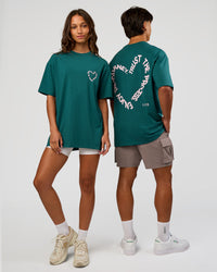 Duo wearingLove The Process FLXCotton Oversize Tee - Transformative Teal-Marshmallow | Model:Both | Size:Duo