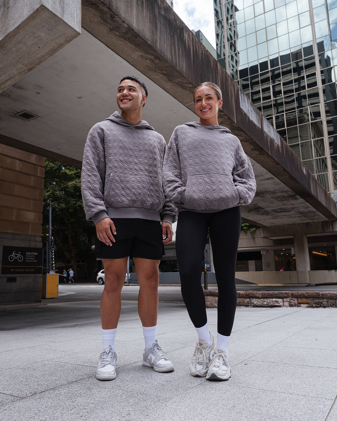 Duo wearing MVP Quilted Oversized Hoodie - Storm Front-Geometric | Model:Duo | Size:Duo