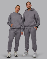 Duo wearing MVP Quilted Oversized Hoodie - Storm Front-Geometric | Model:Duo | Size:Duo