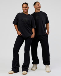 Duo wearing Move Fast Heavyweight Oversized Tee - Black Washed | Model:Both | Size:Duo