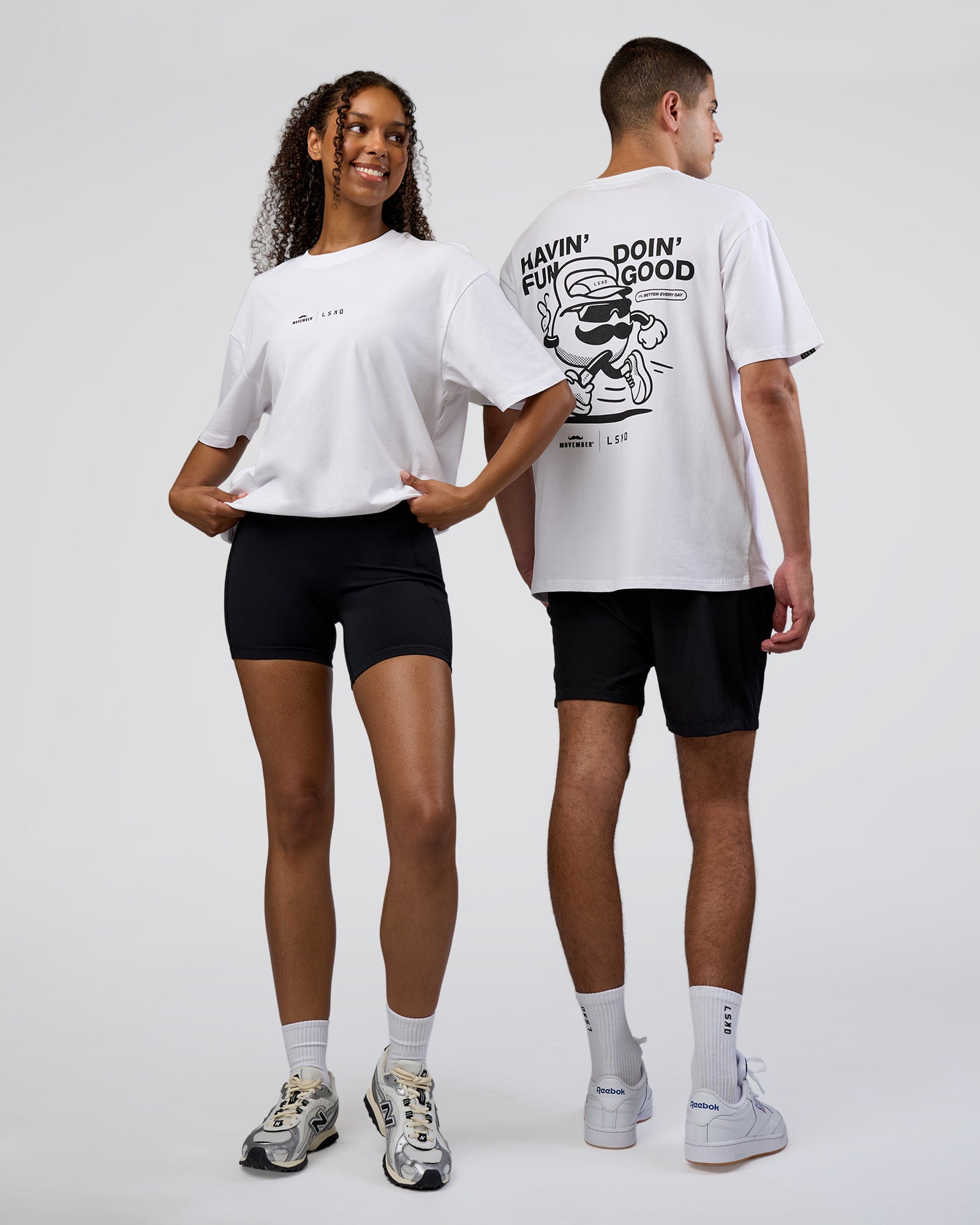 Duo wearing Movember 2025 FLXCotton Oversize Tee - White | Model:Both | Size:Duo