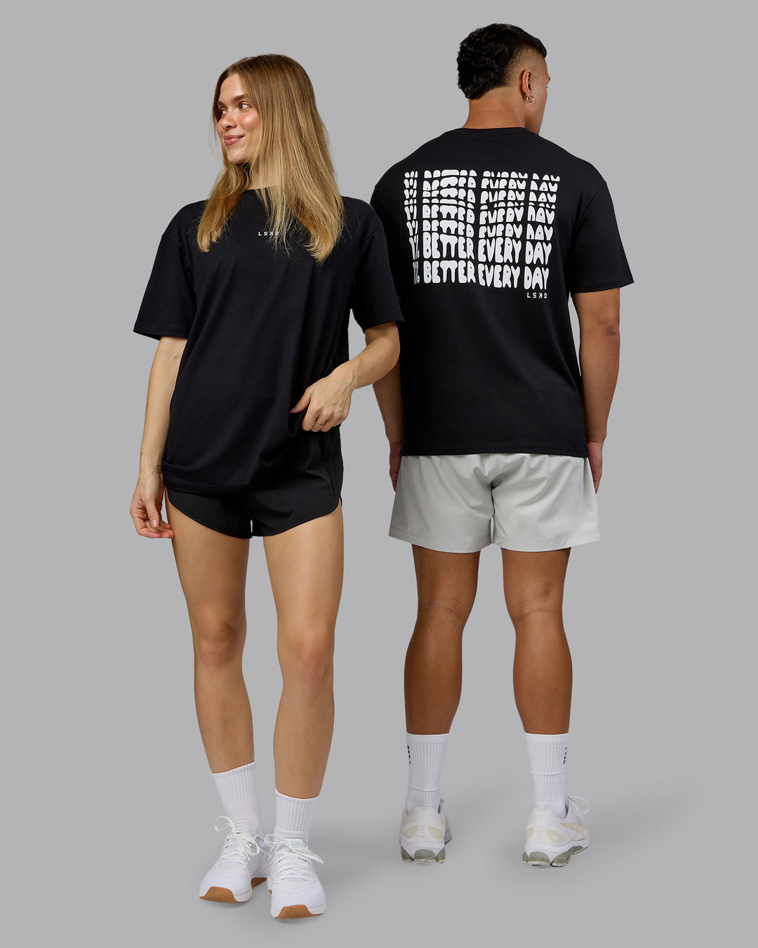 Duo wearing On Repeat FLXCotton Oversized Tee - Black-White | Model:Both | Size:Duo