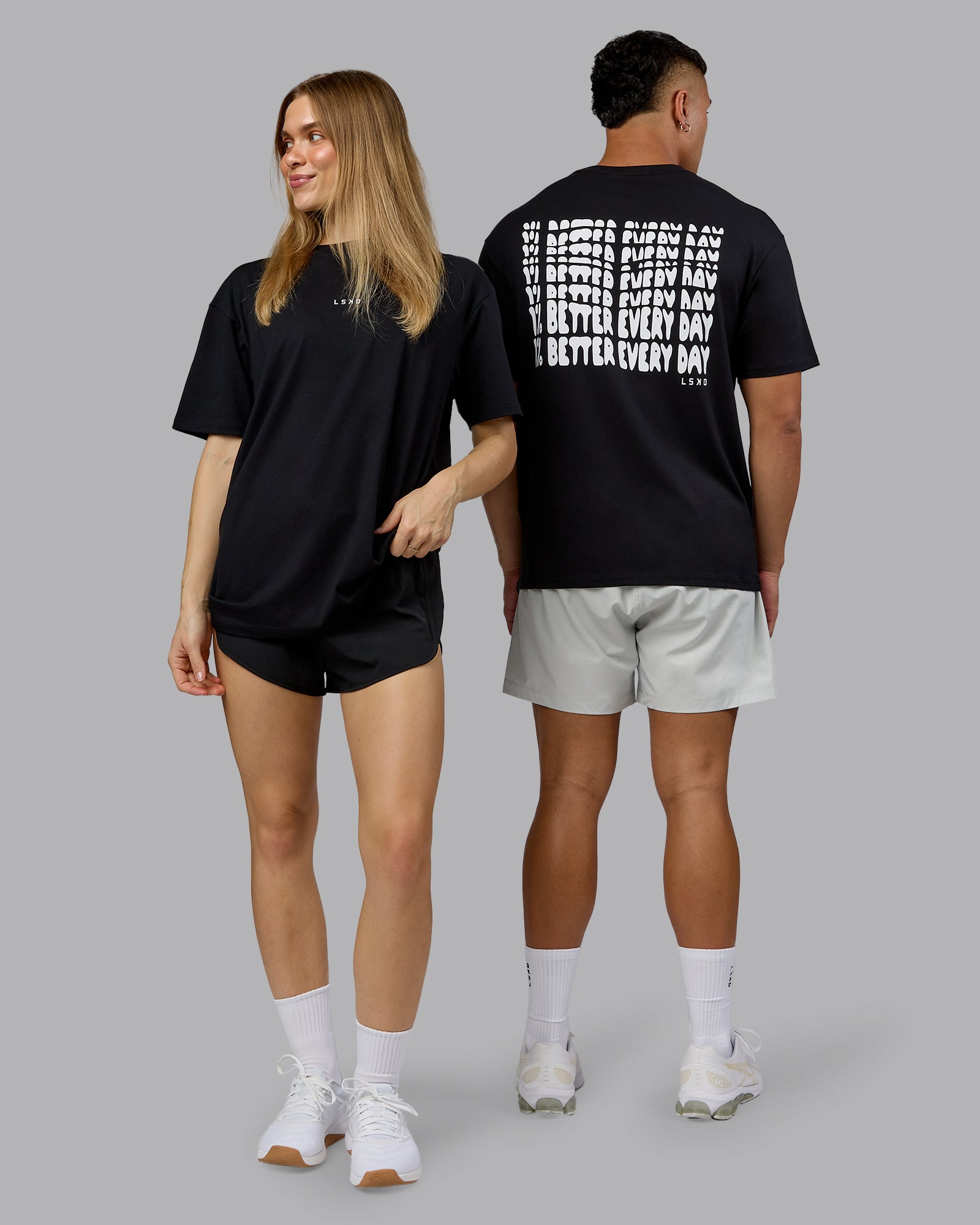 Duo wearing On Repeat FLXCotton Oversized Tee - Black-White | Model:Both | Size:Duo