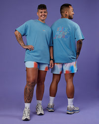 Duo wearing Our Journey Heavyweight Oversized Tee - Azure Blue-Rainbow | Model:Both | Size:Duo