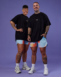 Duo wearing Our Journey Heavyweight Oversized Tee - Black-Rainbow | Model:Both | Size:Duo