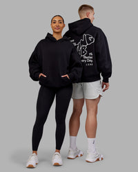Duo wearing Rise & Lift Hoodie Oversized - Black-White | Model:Both | Size:Duo