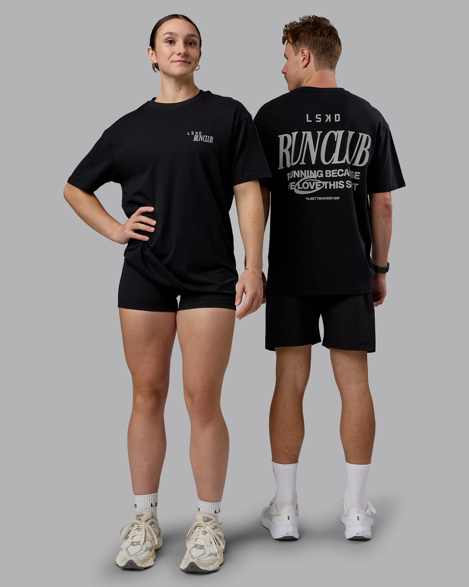 Duo wearing Run Love FLXCotton Oversized Tee - Black-Reflective | Model:Both | Size:Duo
