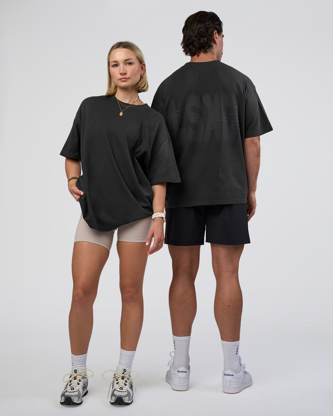 Duo wearing Spray Heavyweight Unisex Oversized Tee - Charcoal Washed | Model:Both | Size:Duo