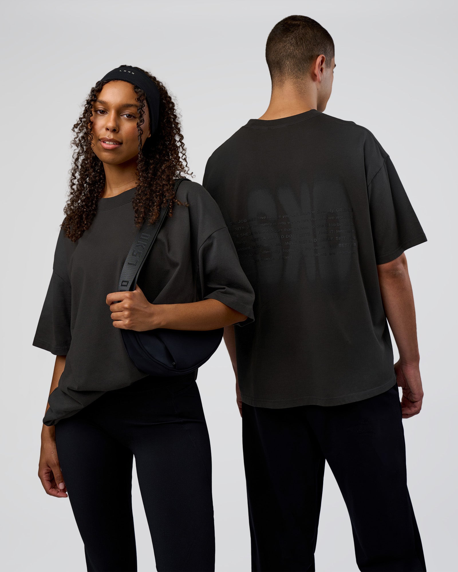 Duo wearing Spray Heavyweight Unisex Oversized Tee - Charcoal Washed | Model:Both | Size:Duo
