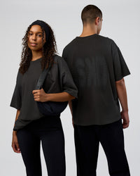 Duo wearing Spray Heavyweight Unisex Oversized Tee - Charcoal Washed | Model:Both | Size:Duo