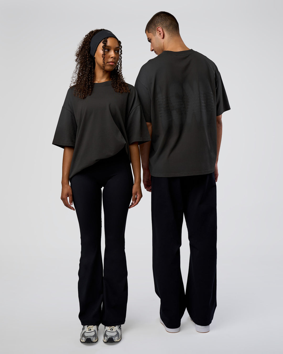 Duo wearing Spray Heavyweight Unisex Oversized Tee - Charcoal Washed | Model:Both | Size:Duo