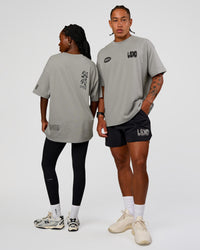 Duo wearing Static Grit Heavyweight Oversized Tee - Alloy-Black | Model:Both | Size:Duo