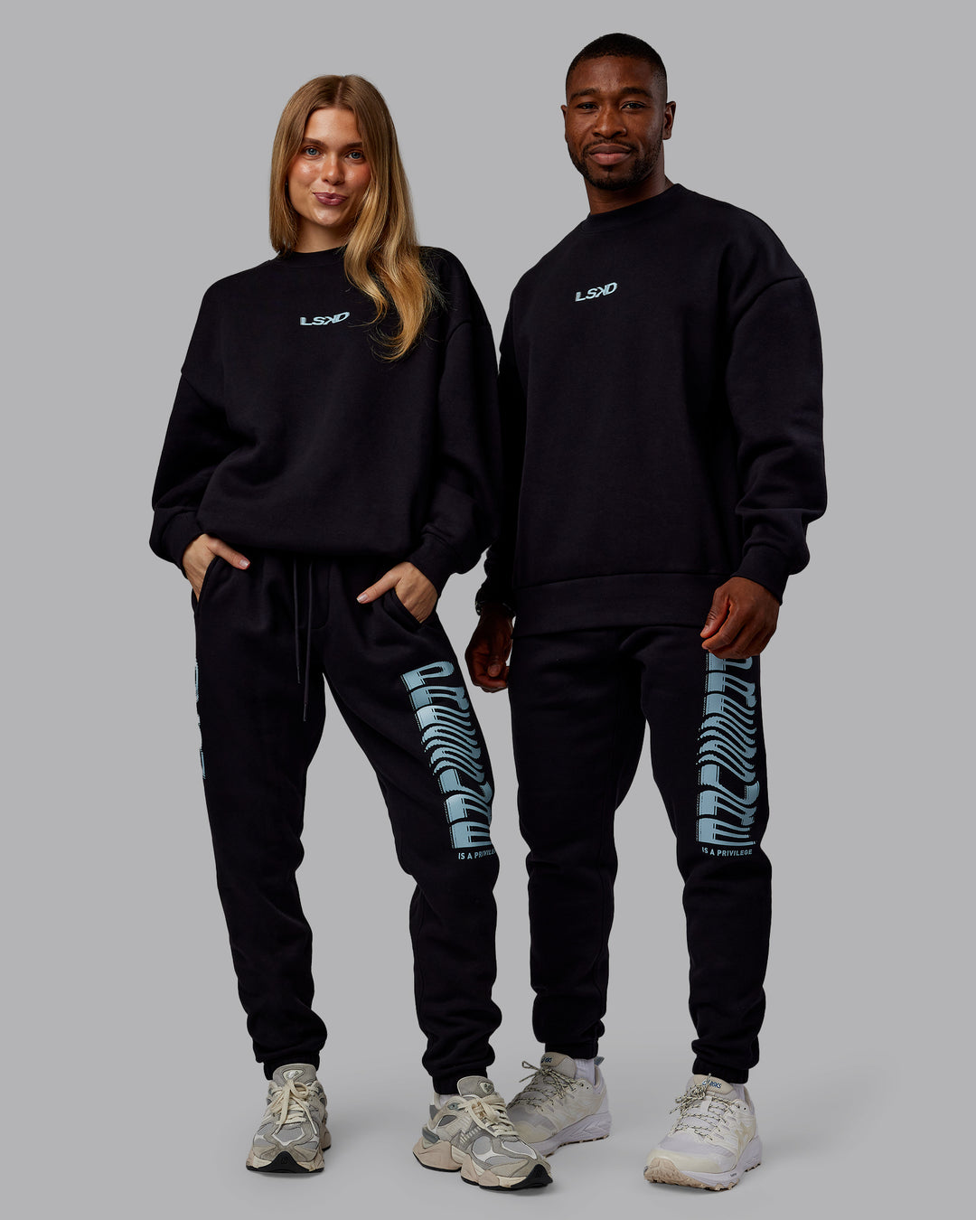 Duo wearing Static Oversized Sweater - Black-Skyride | Model:Both | Size:Duo