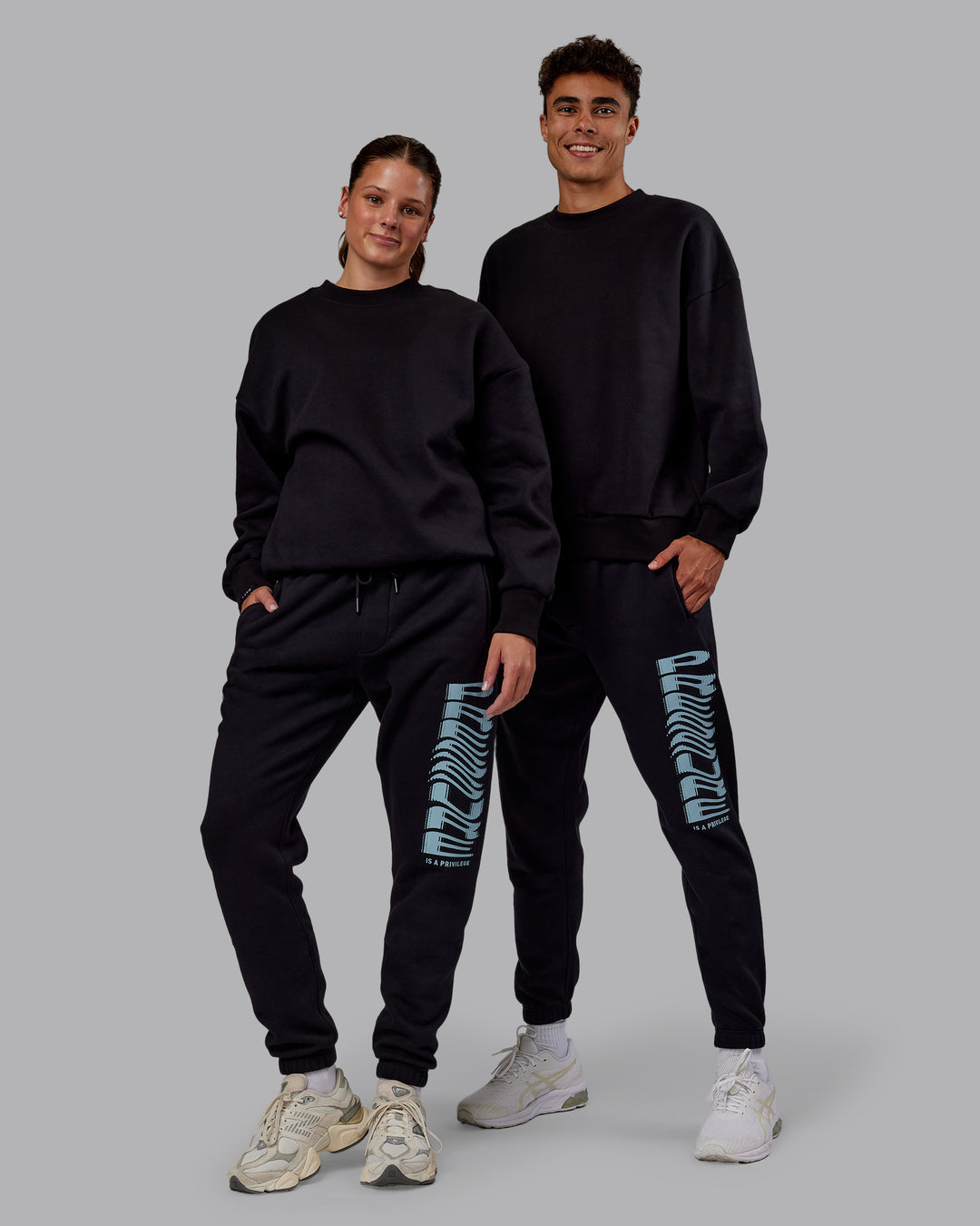 Duo wearing Static Track Pant - Black-Skyride | Model:Both | Size:Duo