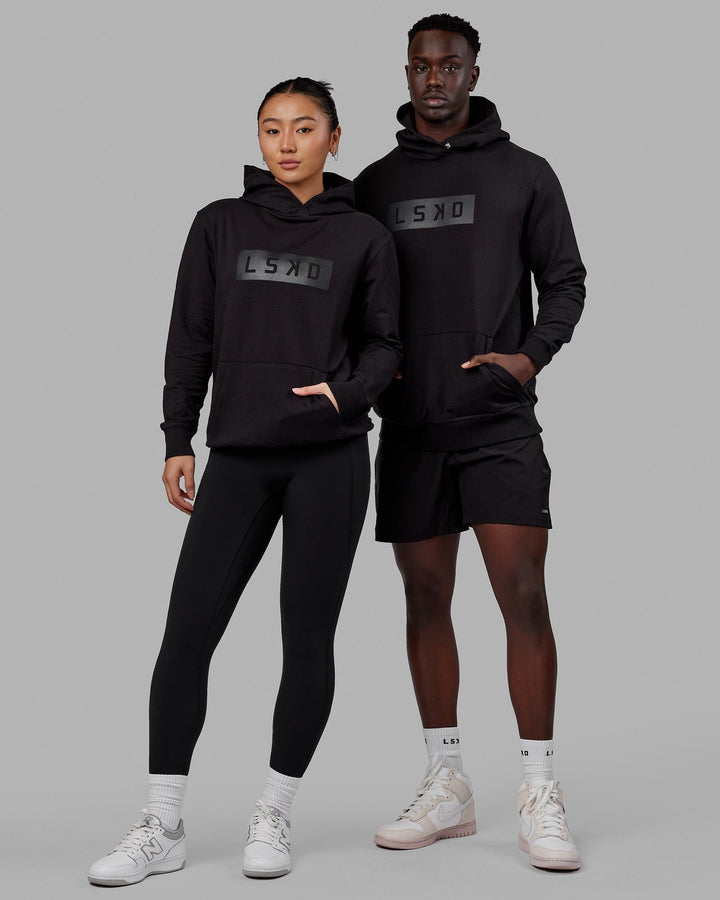Duo wearing Unisex Strength FLXFLeece Hoodie - Black-Black