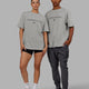 Duo wearing Unisex 1% Better FLXCotton Tee Oversize - Lt Grey Marl-Black