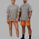 Duo wearing Unisex 1% Better FLXCotton Tee Oversize - Ultimate Grey-Tangerine